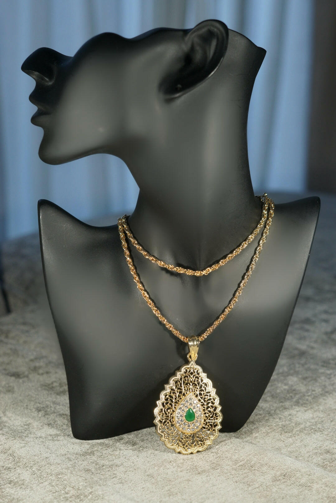 gold coloured filigree necklace with twisted traditional gold chain green stone elegant 