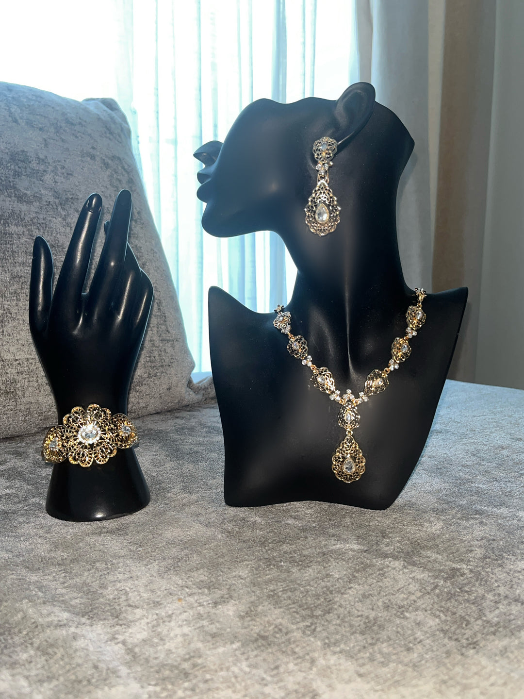 Gold coloured and white diamante collection set