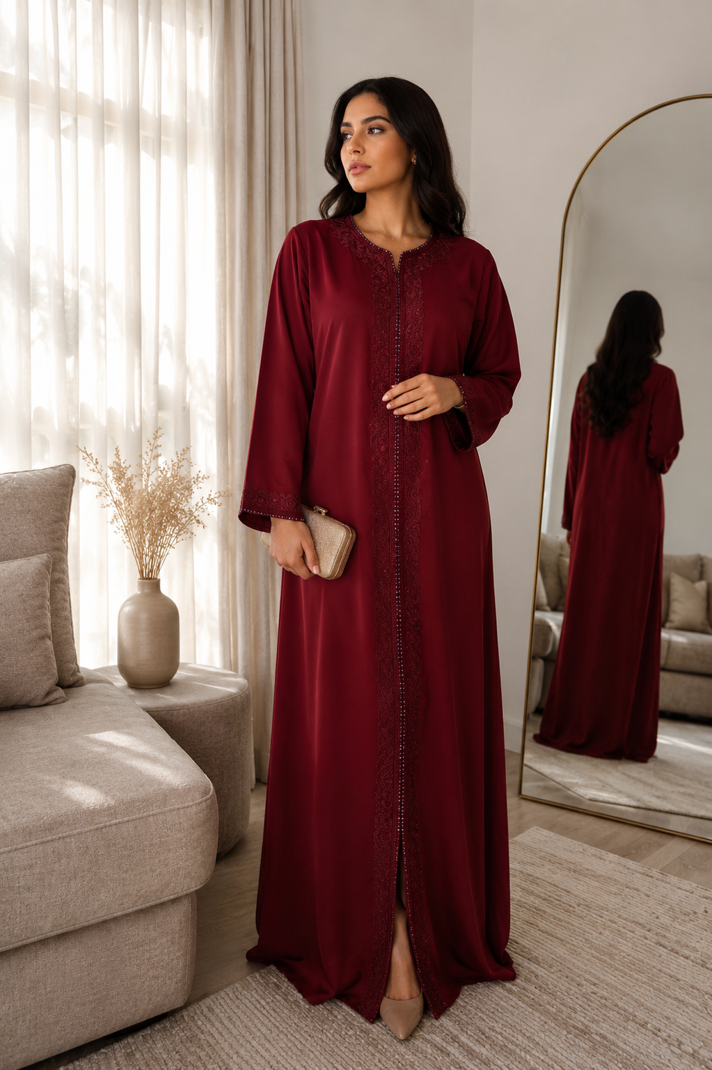 Full-length burgundy Moroccan-inspired dress with elegant embroidered detailing and long sleeves
