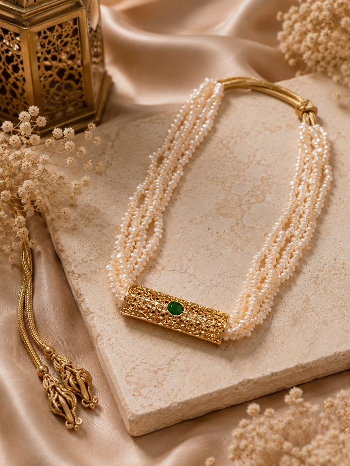 Moroccan pearl necklace, Moroccan jewelry, luxury pearl necklace, gold filigree necklace, emerald necklace, traditional Moroccan jewelry, Moroccan glam accessories, Eid jewelry, bridal necklace, Moroccan wedding jewelry, Arabic jewelry, luxury statement necklace, pearl statement necklace, Moroccan fashion accessories, ornate gold necklace, modest luxury fashion, Moroccan heritage jewelry, takchita accessories, caftan jewelry, North African jewelry