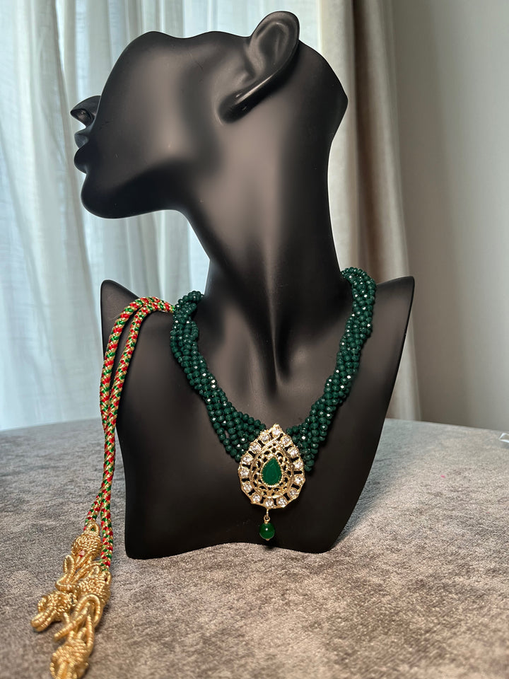 Moroccan emerald necklace, Moroccan jewelry, luxury Moroccan necklace, green beaded necklace, emerald gemstone necklace, Moroccan glam accessories, Moroccan bridal jewelry, traditional Moroccan jewelry, Arabic jewelry, North African fashion accessories, luxury statement necklace, Eid jewelry, Moroccan wedding jewelry, henna accessories, gold filigree necklace, crystal statement necklace, Moroccan caftan accessories, Moroccan heritage jewelry, modest luxury fashion, takchita jewelry, emerald green jewelry, h